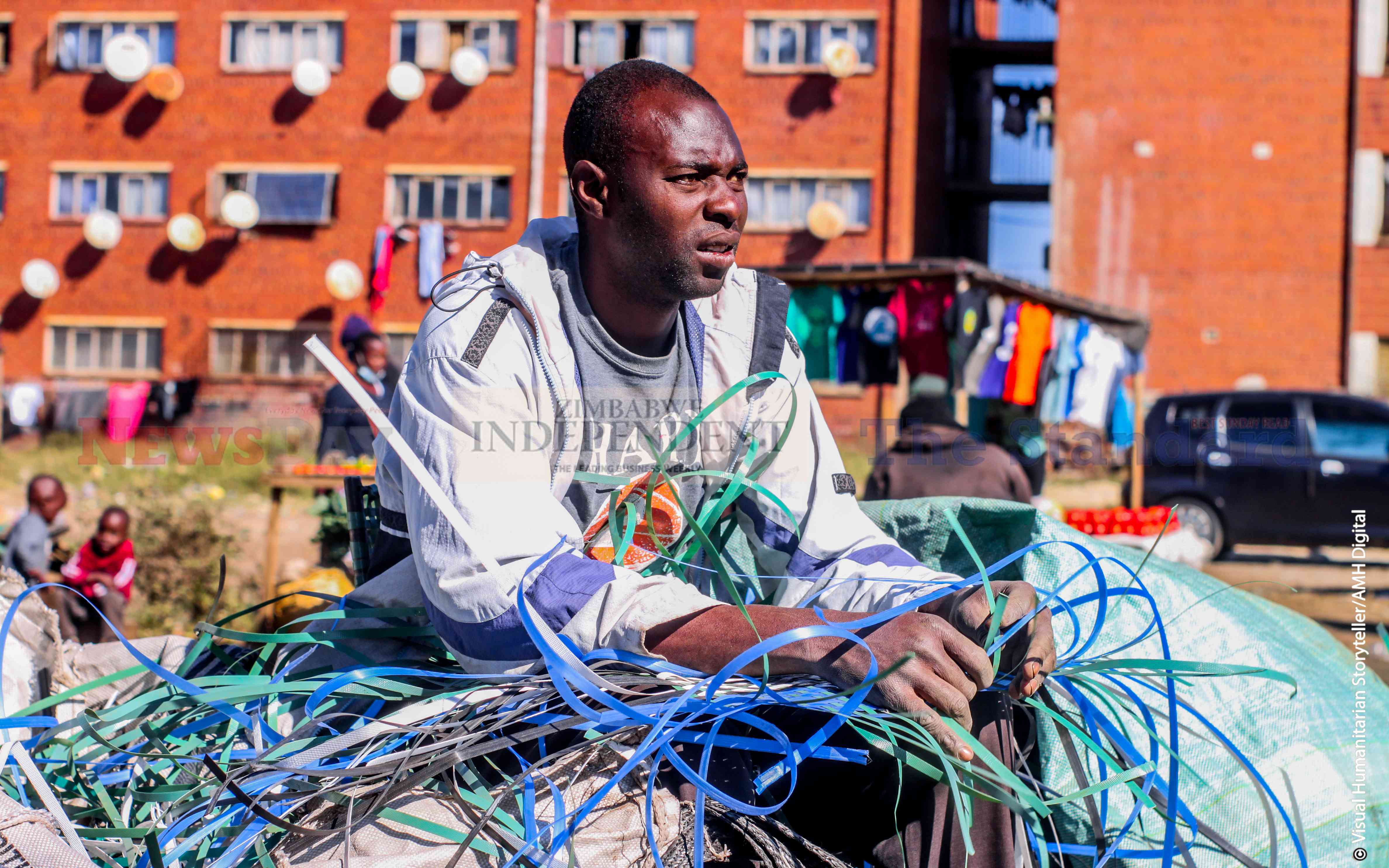 Martin Simbachako (33)  weaves baskets in Mbare ,turning trash into treasure.