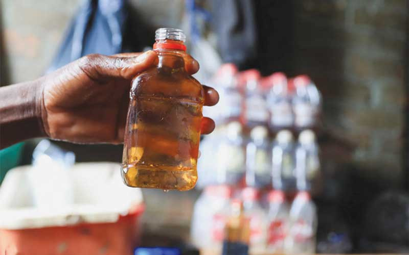 Zimbos turn to the bottle as economy bites