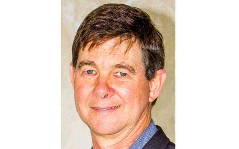 Former farm owners divided over compensation deal