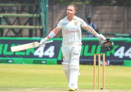 Curran century puts Zim in command on Day Two
