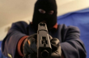 Armed robber shoots cop dead inside police station