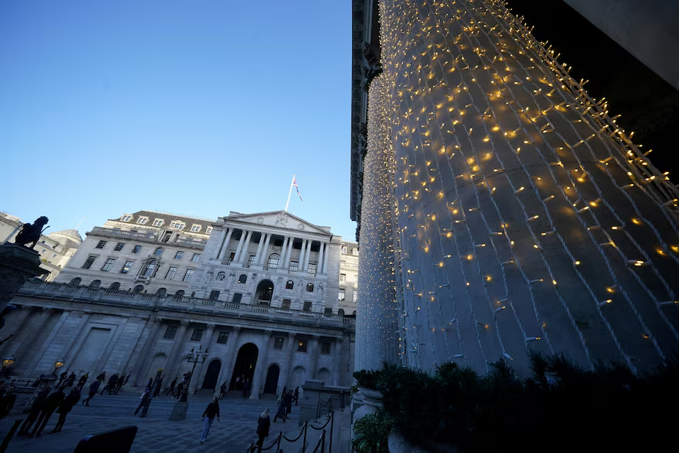 Bank of England cuts rates after tight vote but signals caution over further moves