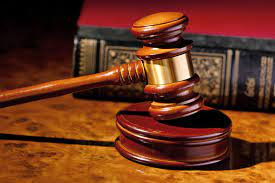 Businesswoman dragged to court over US$2 400 debt