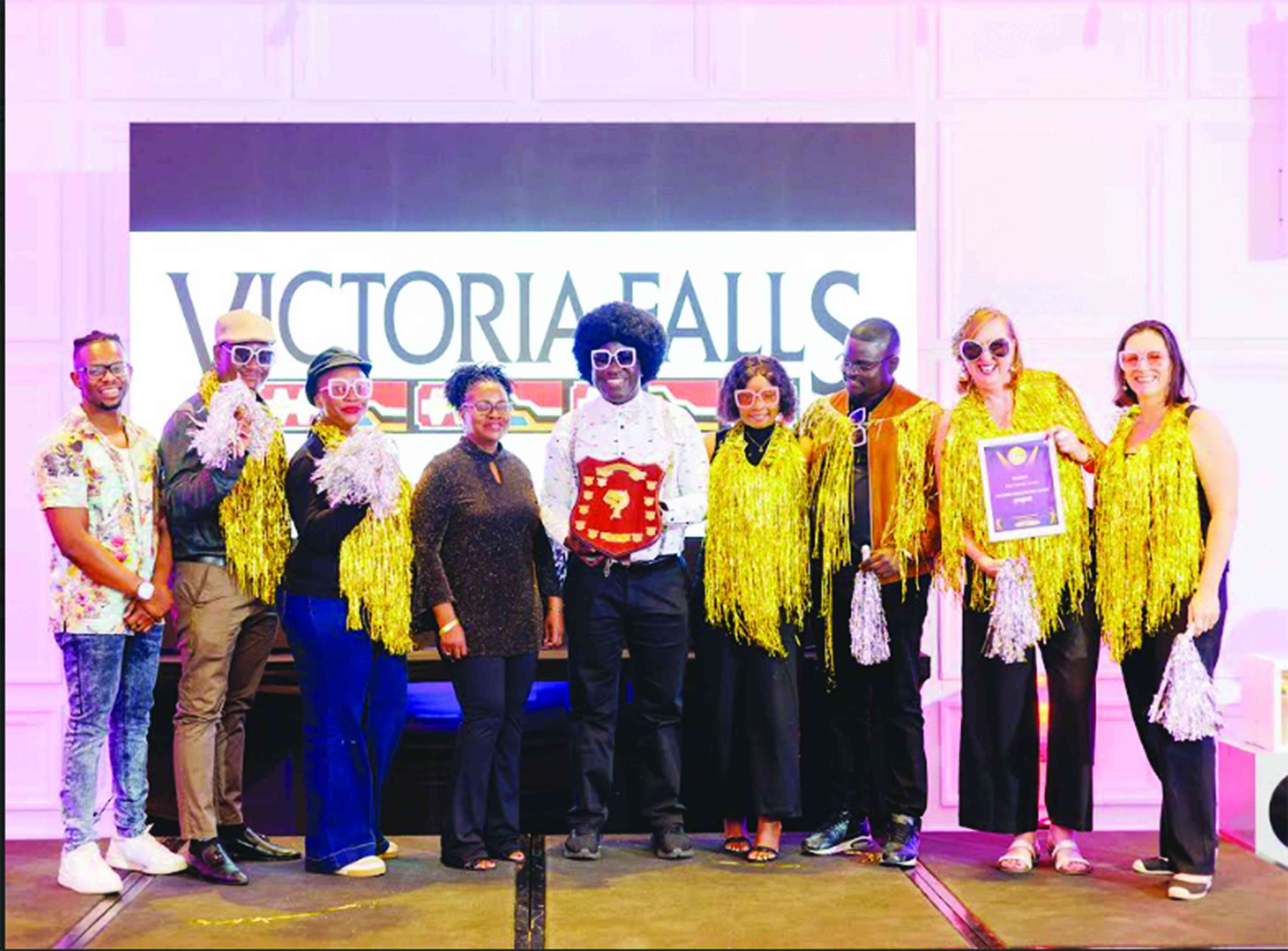 Vic Falls Safari Collection team celebrates win at Azta