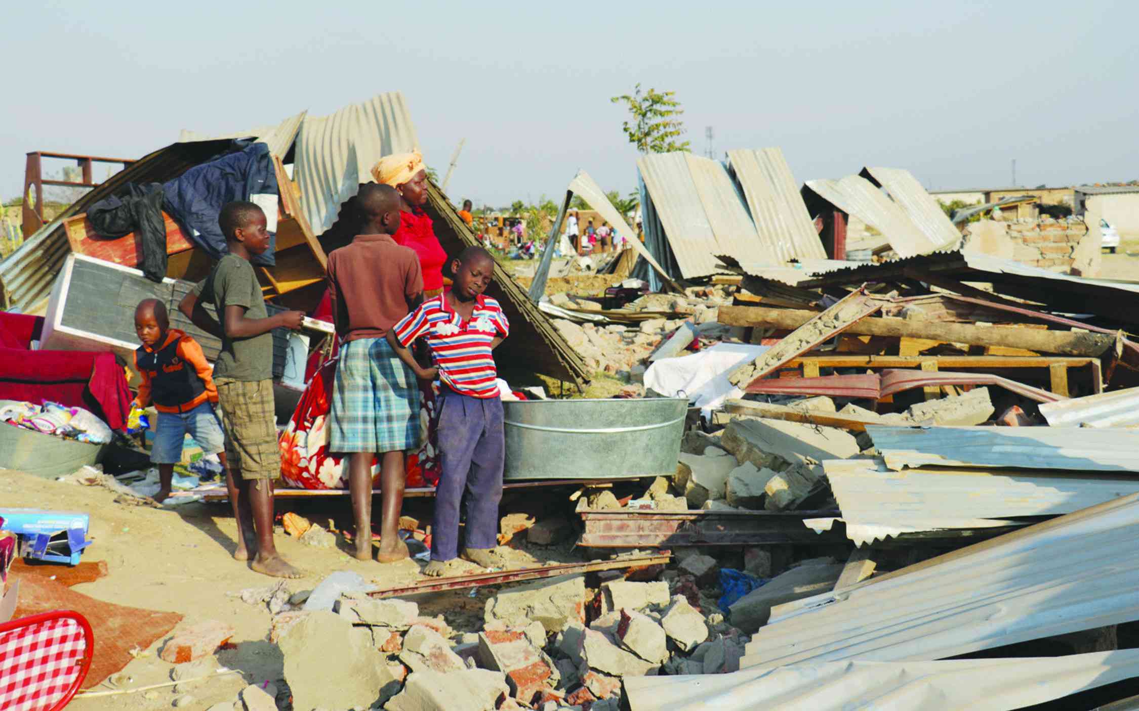 Govt must tackle the land barons scourge decisively