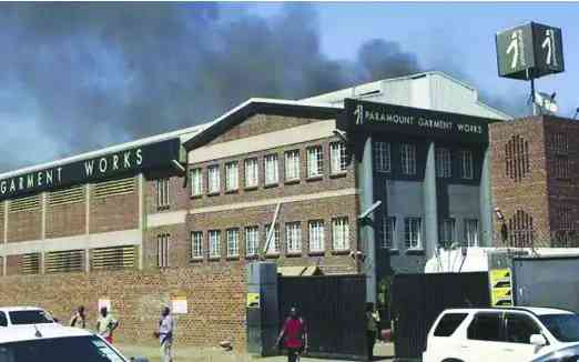 Insurer ordered to rebuild burnt  factory